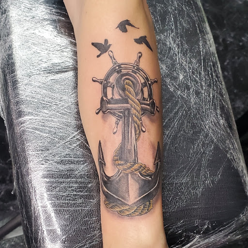 Explore cover up tattoos ideas forearm, creative tattoo ideas in Debary, available at Divine Line Tattoos