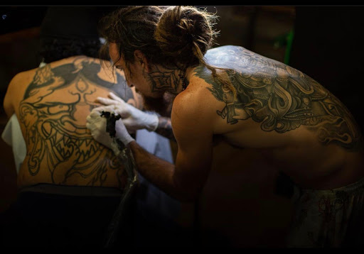 Explore michigan football tattoo ideas, creative tattoo ideas in Saint Petersburg, available at Buku Tattoo Studio