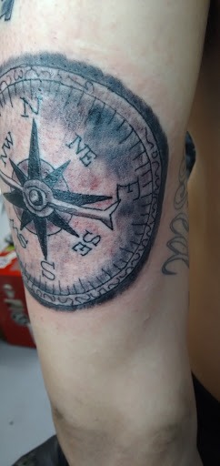 Explore dirt bike tattoos ideas, creative tattoo ideas in Meridian, available at SK-Tattoo1