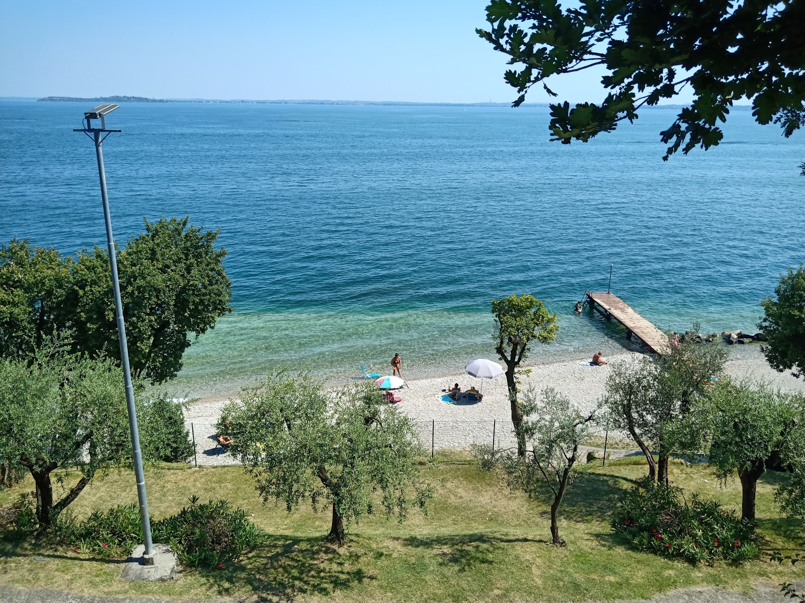 Foto av Spiaggia di San Sivino med blå rent vatten yta