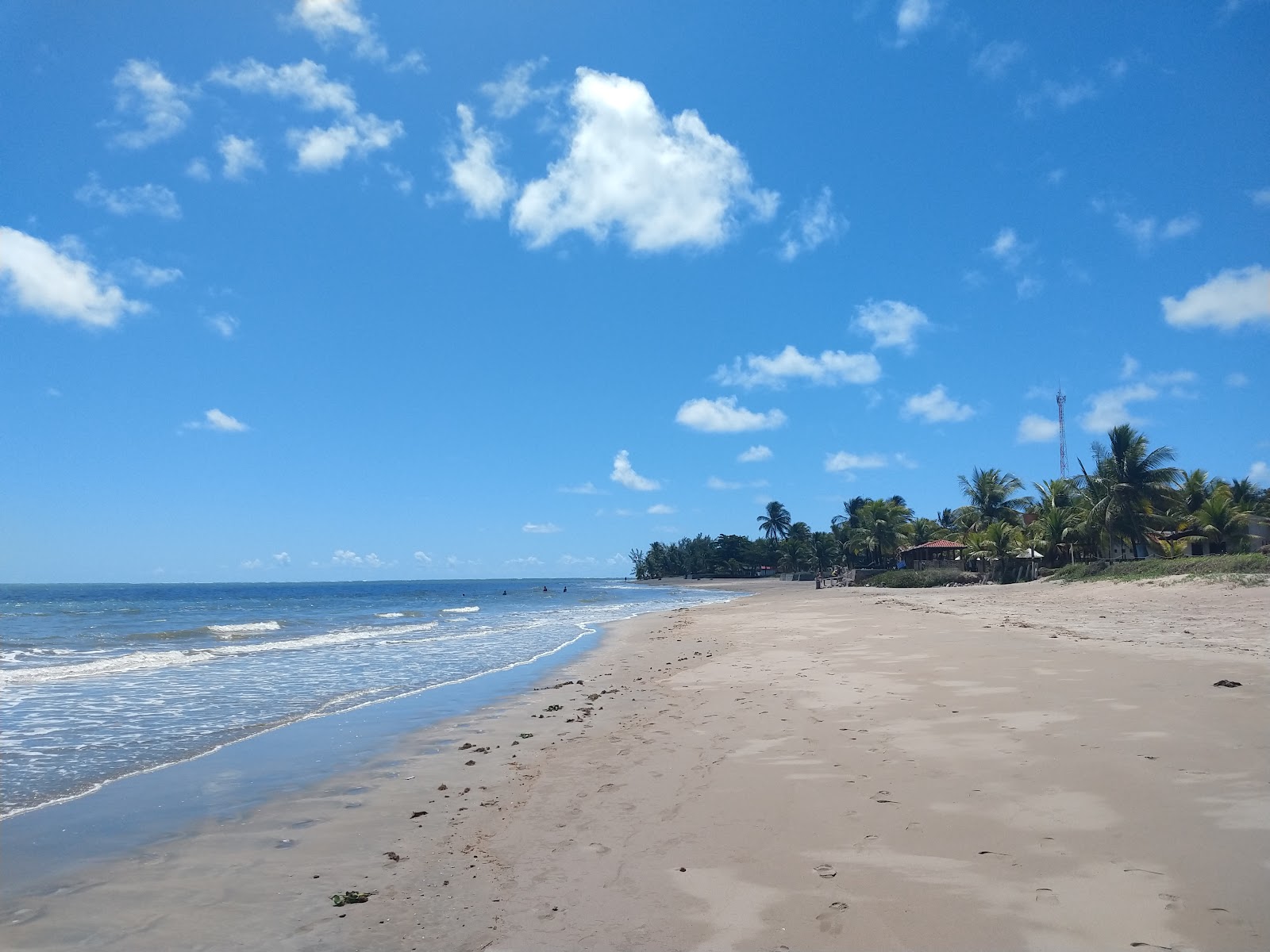 Foto van Praia de Japaratinga II met recht en lang