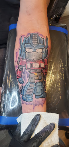 Explore tattoo scroll ideas, creative tattoo ideas in Fresno, available at Happy Client Tattoo