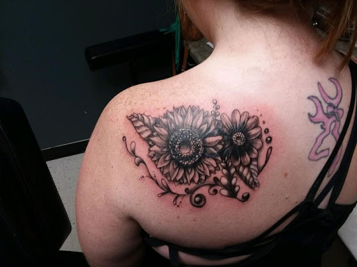 Explore diving tattoo ideas, creative tattoo ideas in Rapid City, available at Black Hills Tattoo & Piercing