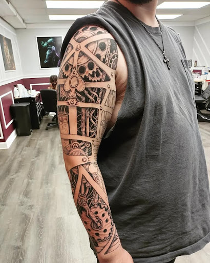 Find sternum tattoo ideas for your next unique tattoo in Westland at Premier Tattoo Company Westland