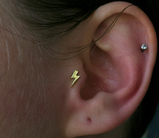 Explore music tattoo ideas men, creative tattoo ideas in Bloomington, available at Smokin Aces Tattoo Company