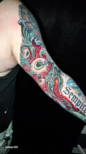 Explore lion family tattoo ideas, creative tattoo ideas in Buford, available at Inked Arts Tattoo Studio