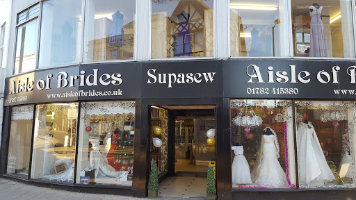 Aisle of Brides and The Suited Groom