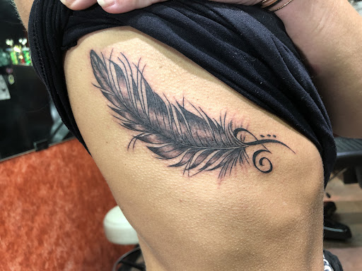 Explore face tattoos ideas, creative tattoo ideas in Sedona, available at Physical Graffiti Tattoo