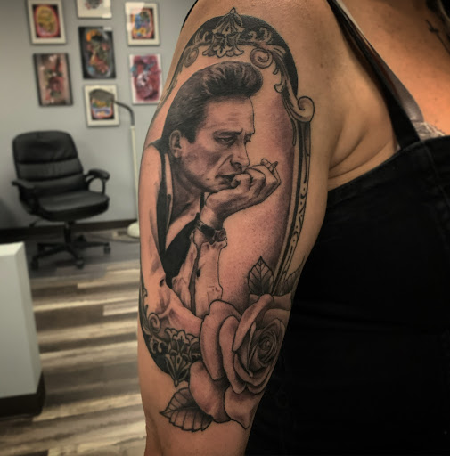 Explore dainty flower tattoo ideas, creative tattoo ideas in Altoona, available at Electric Wave Tattoo