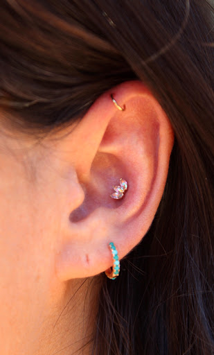Explore arch angel tattoo ideas, creative tattoo ideas in Brooklyn, available at Ahimsa Piercing Studio & BVLA Fine Jewelry