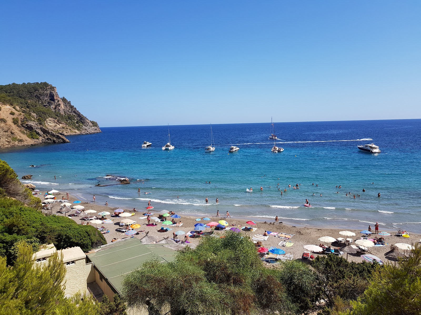 Photo of Cala Boix with turquoise pure water surface