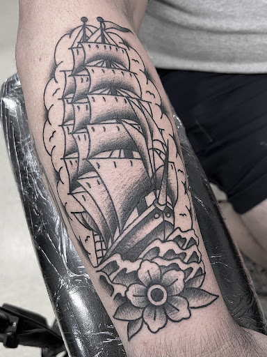 Find tattoos under the breast ideas for your next unique tattoo in Elkin at Black Bear Tattoo
