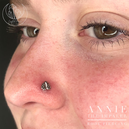 Find music tattoo ideas for men for your next unique tattoo in Bloomington at Crystal Moon Body Arts