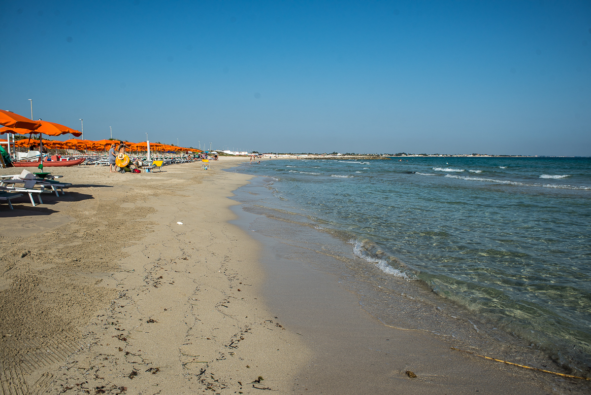 Foto von Maluha Bay mit heller feiner sand Oberfläche