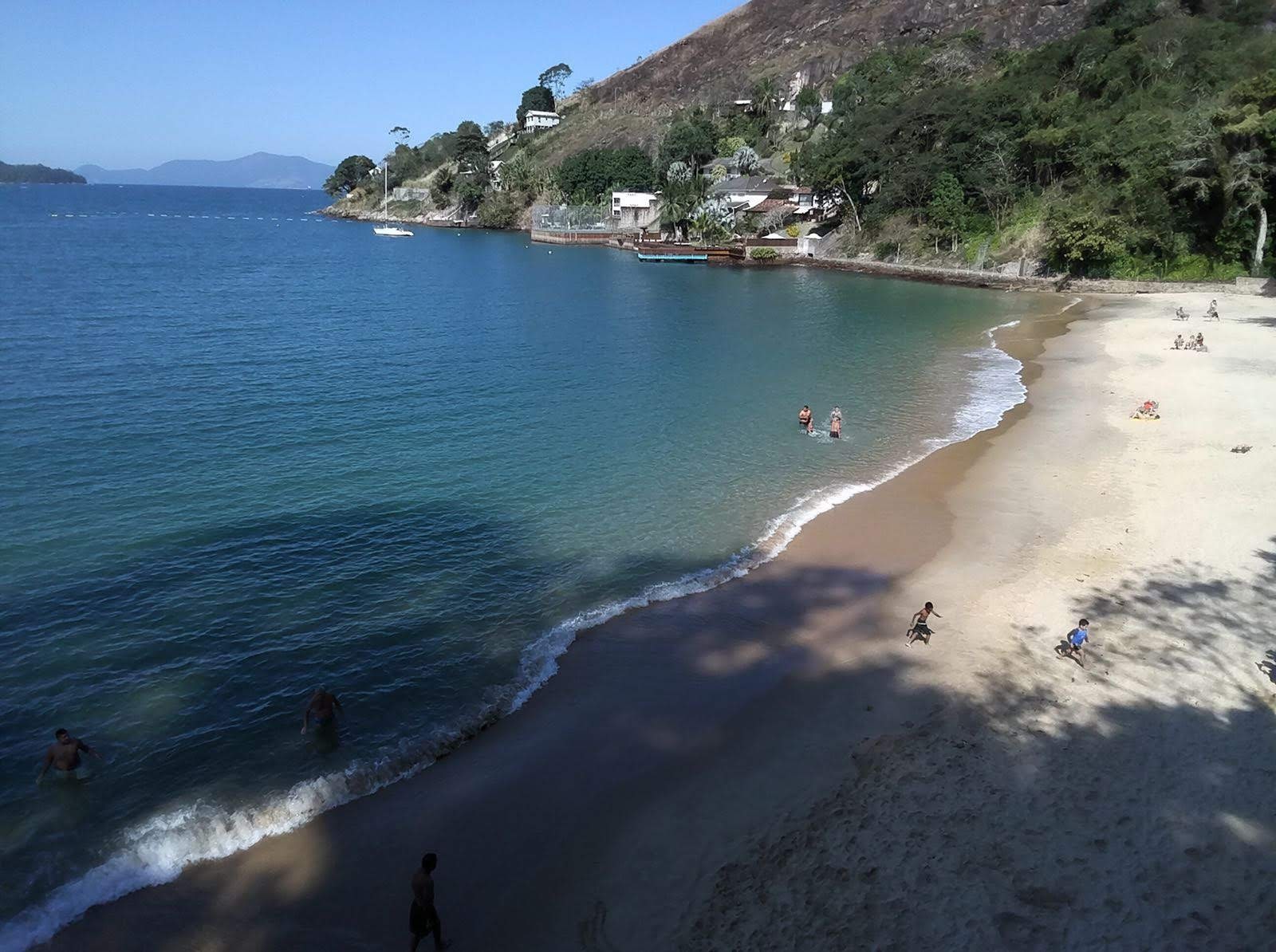 Photo of Caetes Beach backed by cliffs