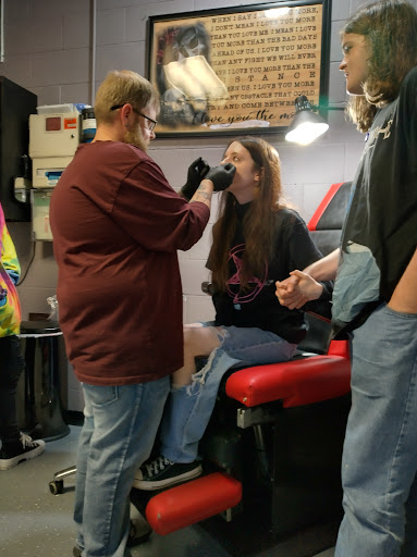 Explore back neck tattoo ideas, creative tattoo ideas in Savannah, available at Hardin county Ink