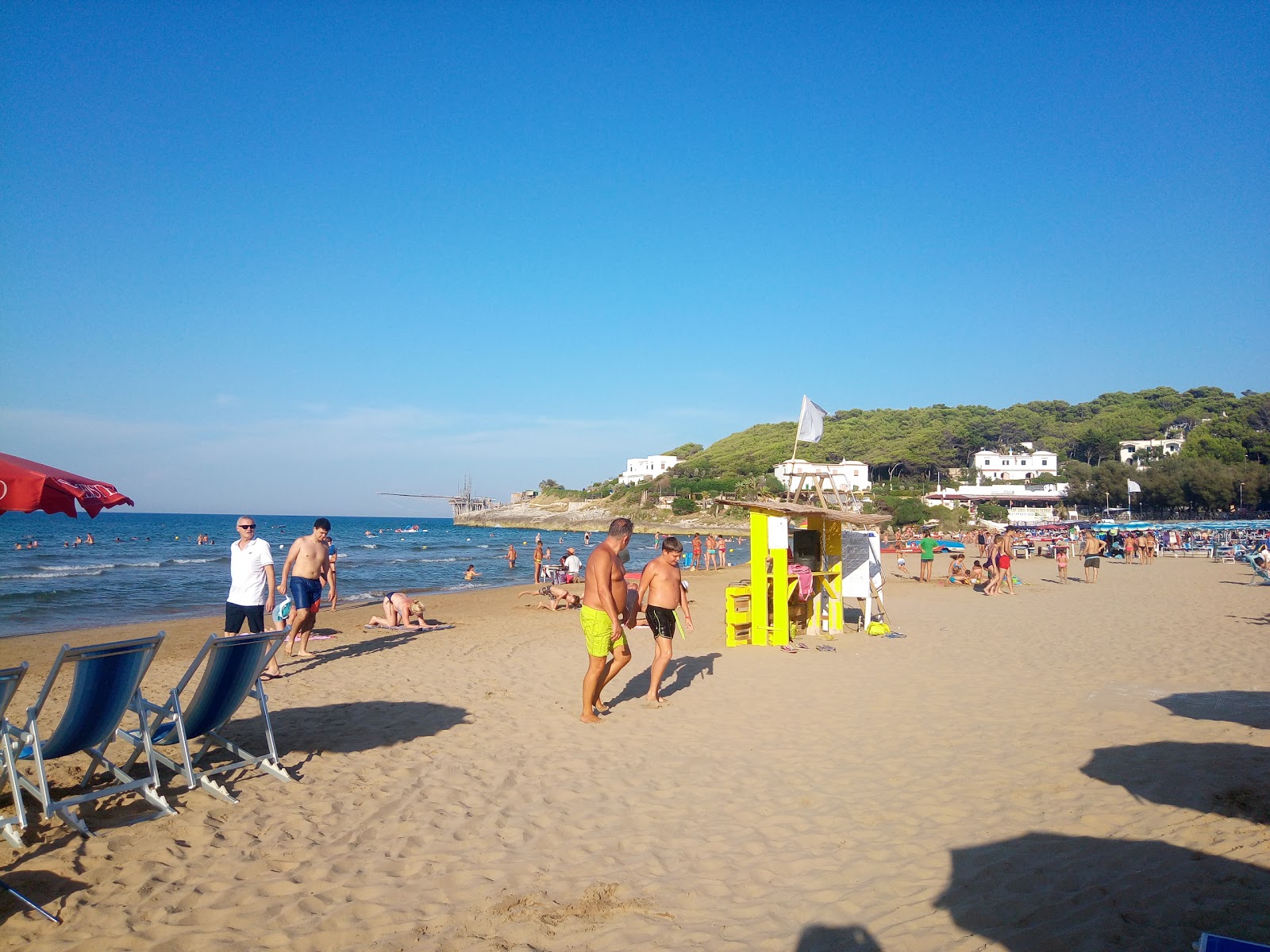 Foto van Spiaggia di Bescile met ruime baai