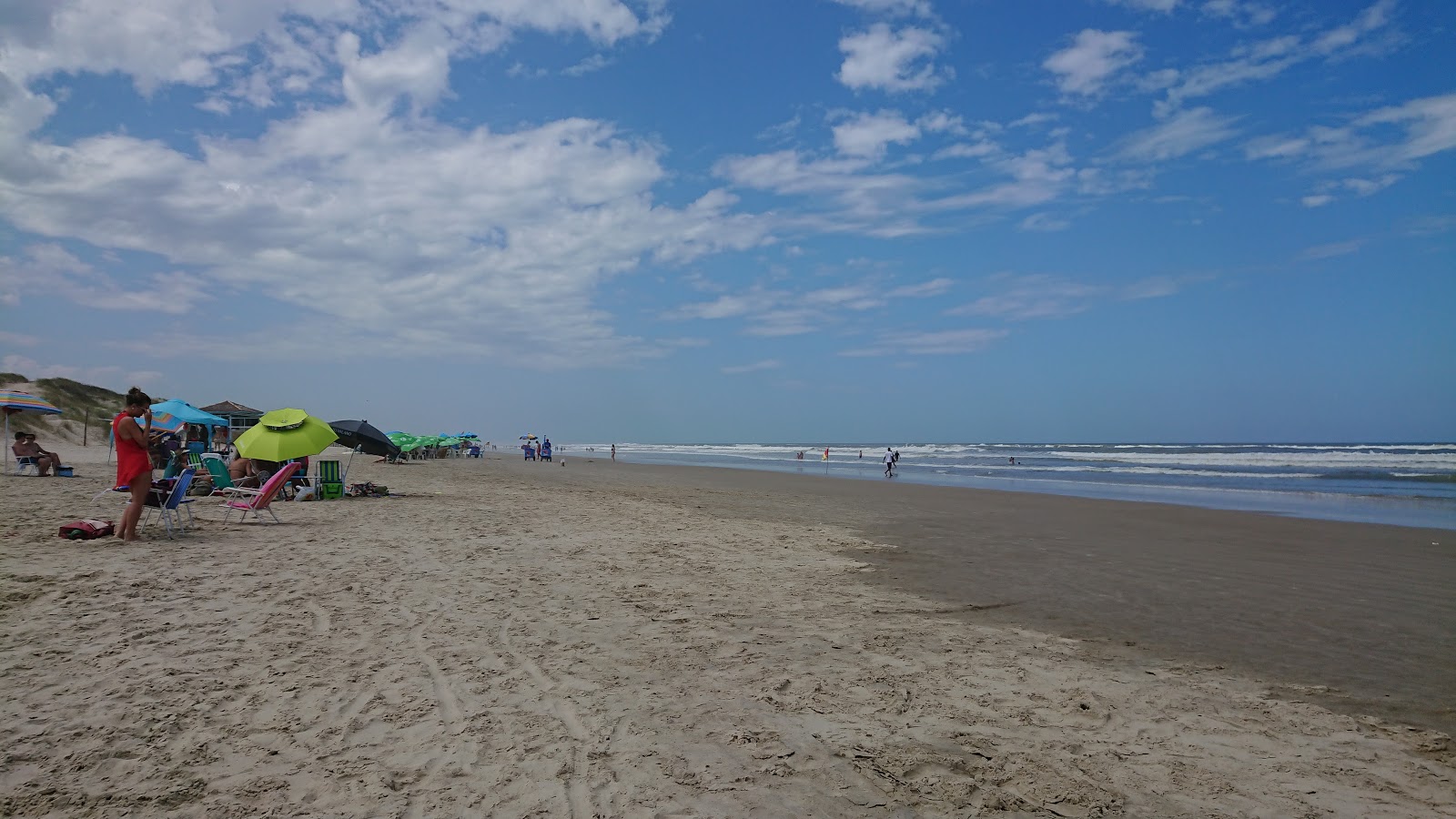 Photo de Praia de Imbe avec l'eau turquoise de surface