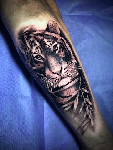 Explore beautiful crazy tattoo ideas, creative tattoo ideas in Adrian, available at Ambition Ink