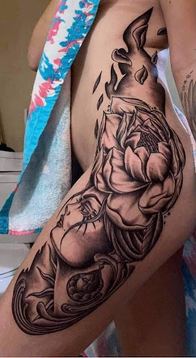 Explore meaningful elegant spine tattoo ideas, creative tattoo ideas in Cape Coral, available at UNRIVALED INK