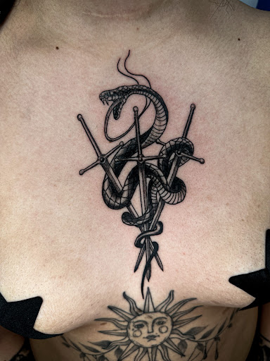 Explore barbell tattoo ideas, creative tattoo ideas in Buford, available at Wild Tribe Tattoos and Piercings