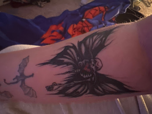 Explore lily tattoo ideas, creative tattoo ideas in Joplin, available at Winterhart Studio