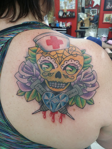 Tattoo Shop «Eye For An Eye Tattoo Parlor», reviews and photos, 1405 N Frazier St, Conroe, TX 77301, USA