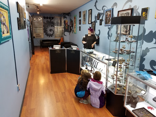 Explore evil dead tattoo ideas, creative tattoo ideas in New York, available at Studio 28 Tattoos, Body Piercing, and Fine Jewelry