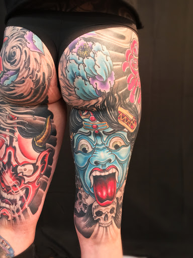 Explore knee cap tattoo ideas for men, creative tattoo ideas in Peoria, available at Iron Key Tattoo Studio Inc.