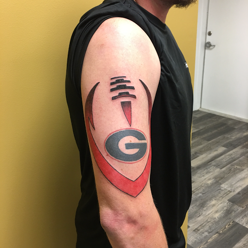 Explore tattoo ideas for women's arms, creative tattoo ideas in Warner Robins, available at Untold Pain Tattoo Studio