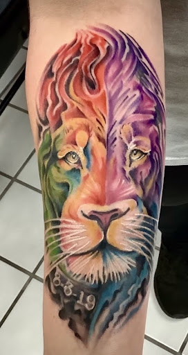 Find chrysanthemum tattoo ideas for your next unique tattoo in Grand Ledge at Van Gogh Tattoos