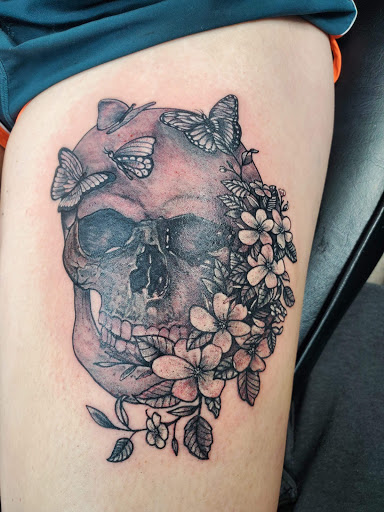 Explore tattoo ideas inside bicep, creative tattoo ideas in Laurel, available at Ambitious Creations Tattoo and Piercing Studio