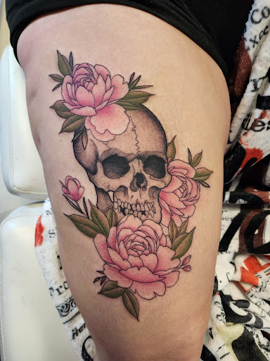 Explore skull rose tattoo ideas, creative tattoo ideas in Easley, available at Peach Pit Tattoo