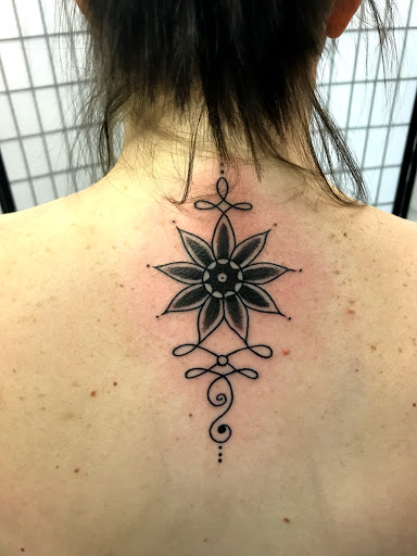 Explore bum tattoo ideas for females, creative tattoo ideas in Kearney, available at Bread N Butter Tattoo