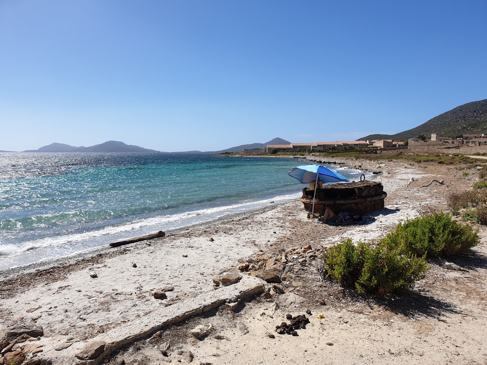 Cala Trabuccato Beach'in fotoğrafı ve yerleşim