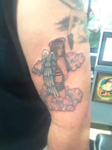 Explore black panther party tattoo ideas, creative tattoo ideas in West Warwick, available at Hold Steady Tattoo