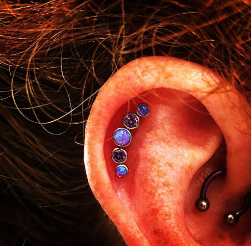 Explore tattoo arm placement ideas, creative tattoo ideas in Youngsville, available at Bad Fun Company