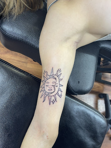 Explore hood neck tattoo ideas, creative tattoo ideas in Cocoa, available at Rorschach Tattoo Shop and Piercing Studio