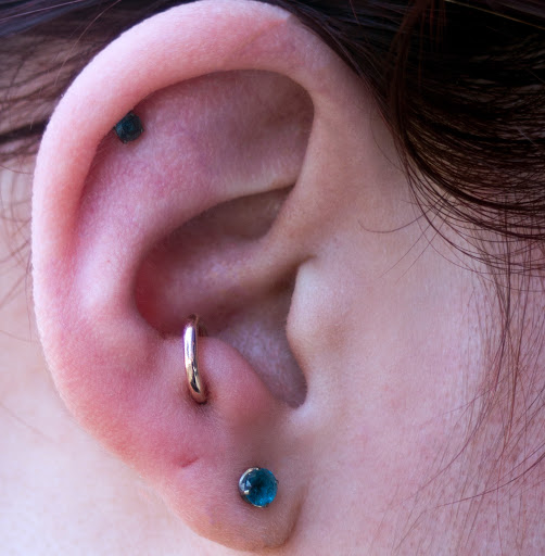 Explore cover up black tattoo ideas, creative tattoo ideas in Bloomington, available at Smokin Aces Tattoo Company