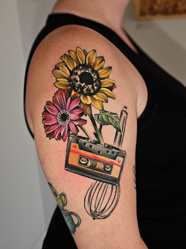 Explore basketball tattoo ideas small, creative tattoo ideas in Kansas City, available at Golden Stag Tattoo and Gallery