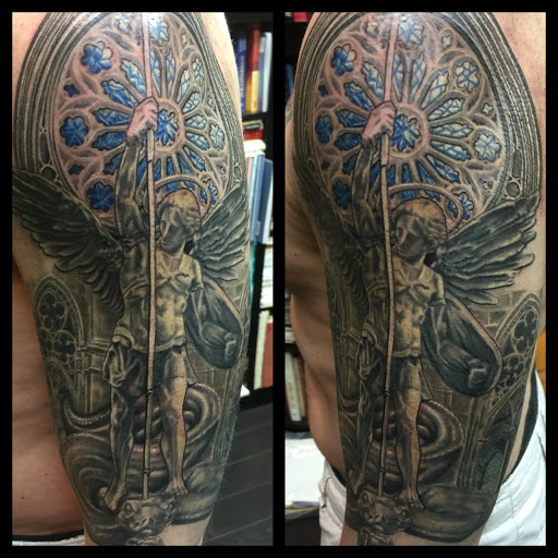 Explore male shoulder tattoo ideas, creative tattoo ideas in Addison, available at Cat Tattoo