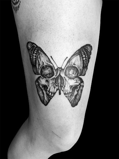 Explore men's back of neck tattoo ideas, creative tattoo ideas in Tucson, available at Gods Country Tattoo Saloon