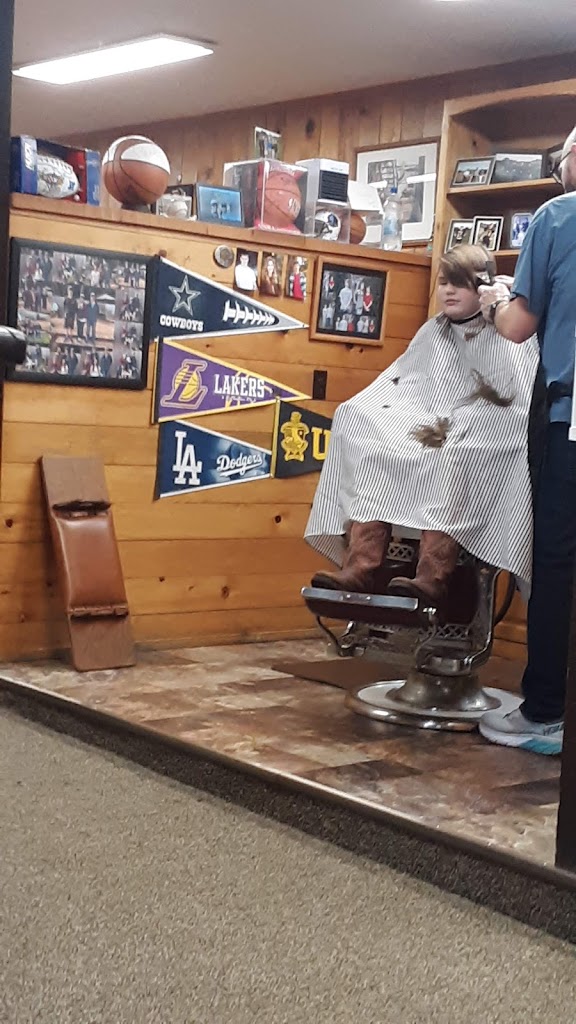 Mick's Hair Surgeons 97411