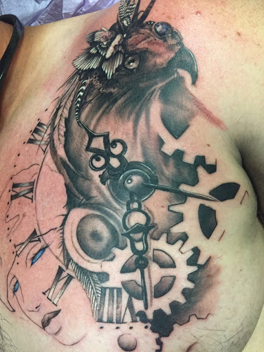 Explore handcuff tattoo ideas, creative tattoo ideas in Savannah, available at Tatlyfe Studios