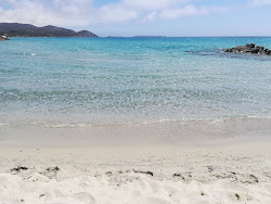 Foto von Porto Giunco (Timi Ama) Strand mit lange, gerade küste