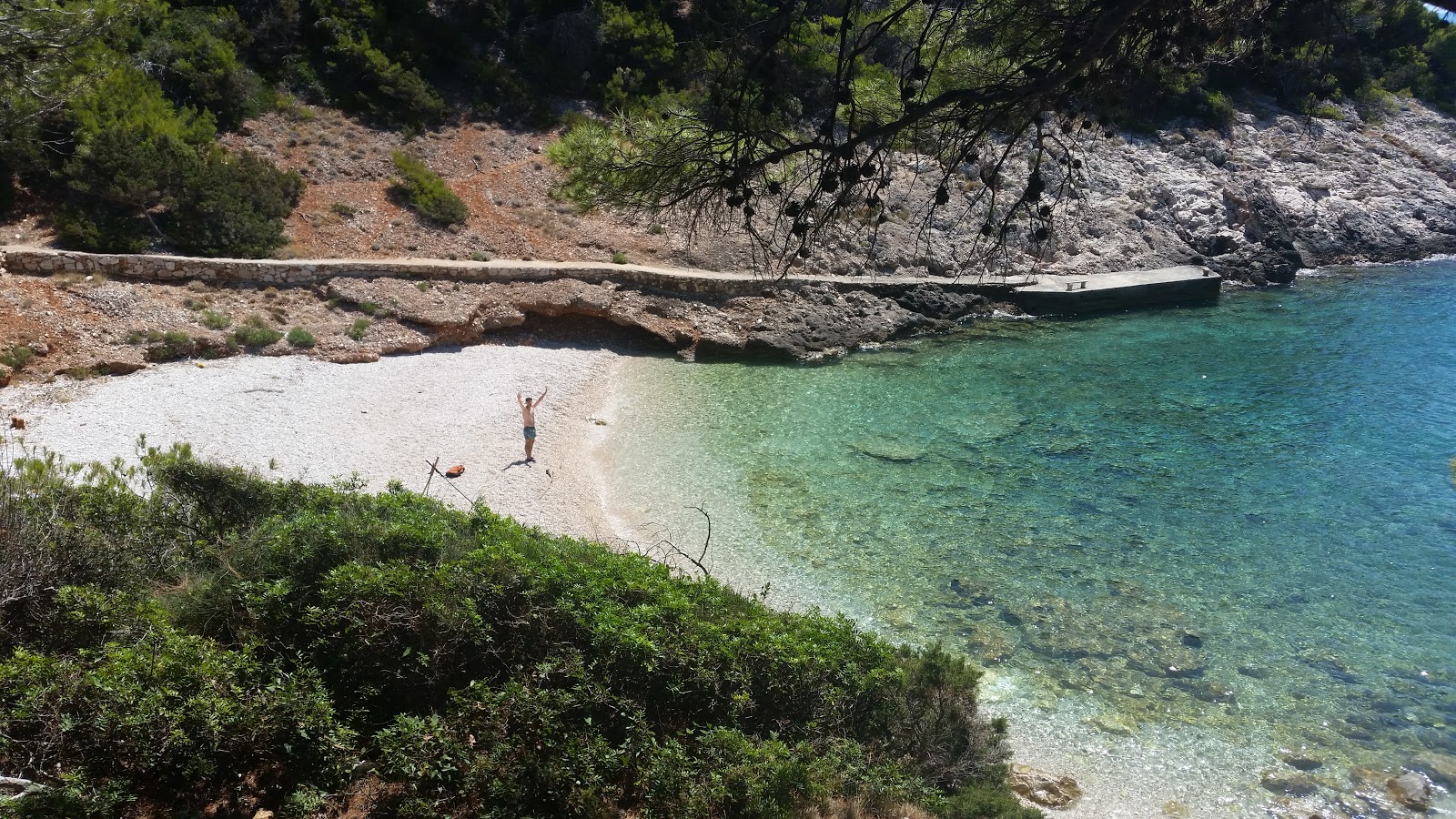 Foto af Piscena beach med let sten overflade