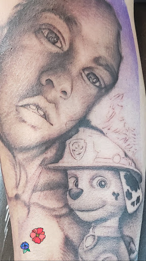 Explore leo sleeve tattoo ideas, creative tattoo ideas in Lakewood, available at Aces and Eights Tattoo