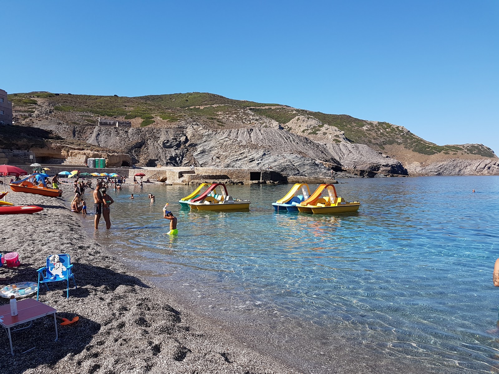 Foto van Cala dell'Argentiera en de nederzetting