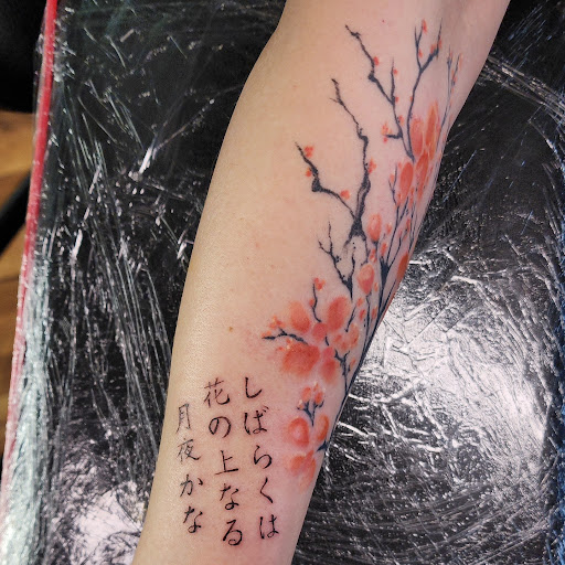 Explore mens tattoo half sleeve ideas, creative tattoo ideas in Minocqua, available at Whisky Rose Tattoo Parlor