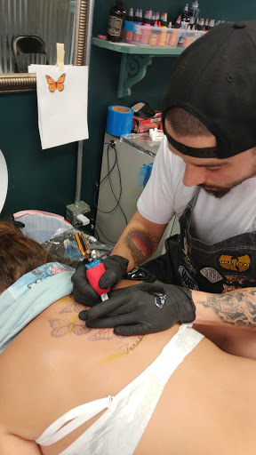 Find family symbol tattoo ideas for your next unique tattoo in Kent at War Horse Ink